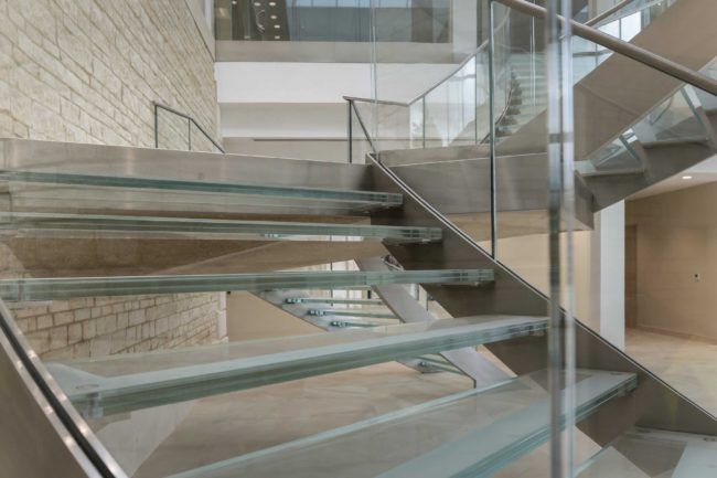 Alltech - bespoke glass feature split staircase