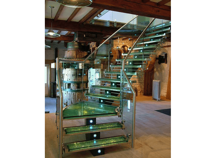 Glass central spine staircases
