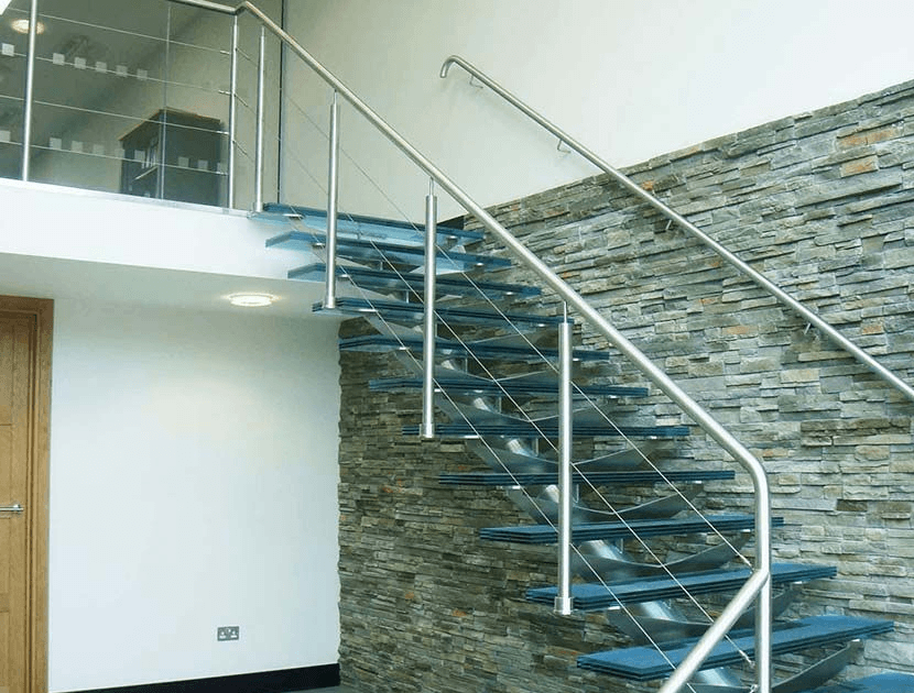 Glass central spine staircase